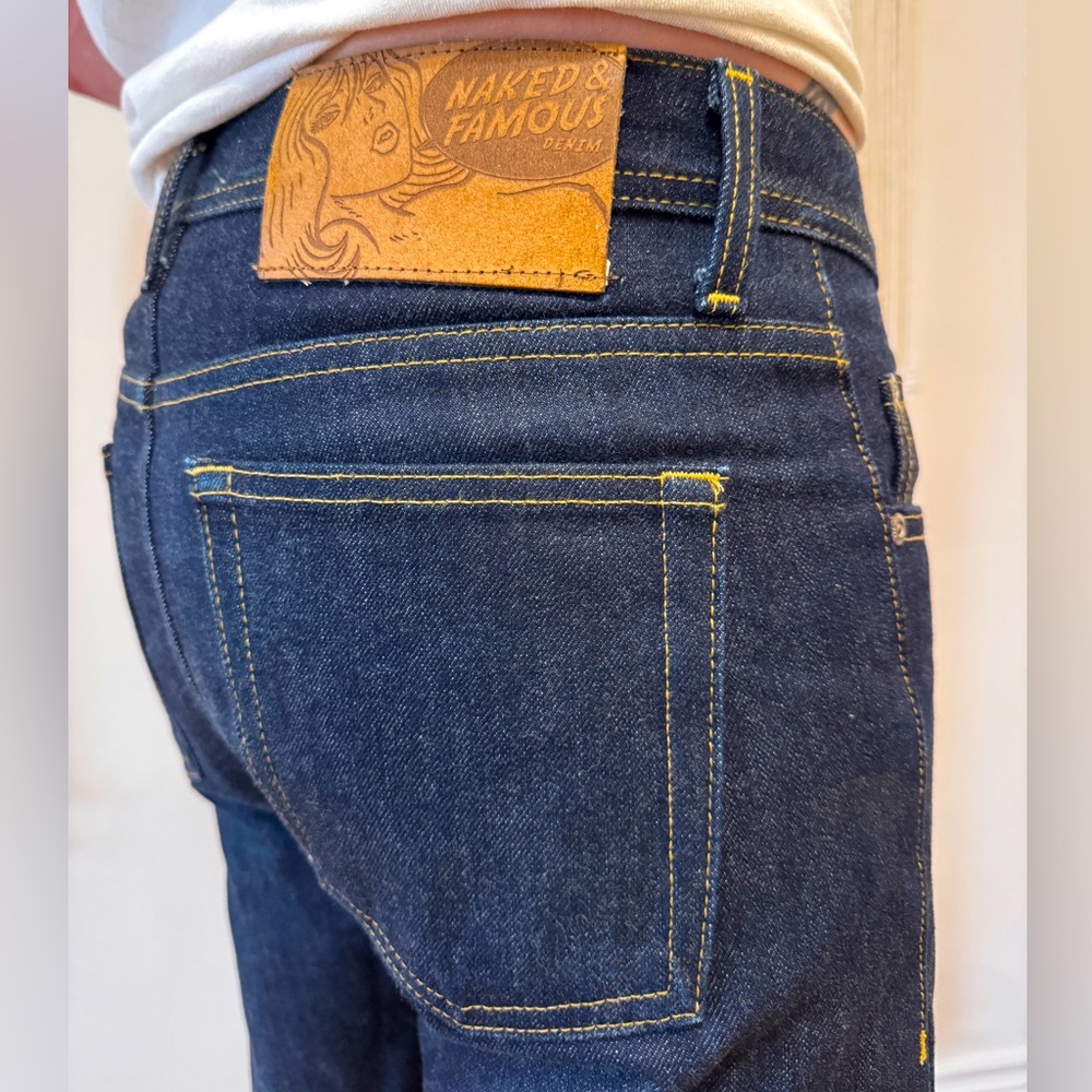 Like New- “salvaged Blue” Naked and Famous Denim Jeans. 31Wx32L. Button fly.